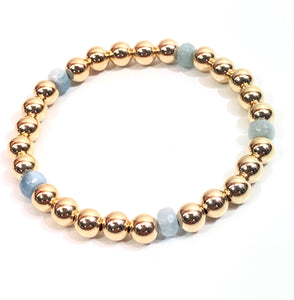 6mm 14kt Gold Filled Bead Bracelet with 5 6mm Oval Aquamarine Beads