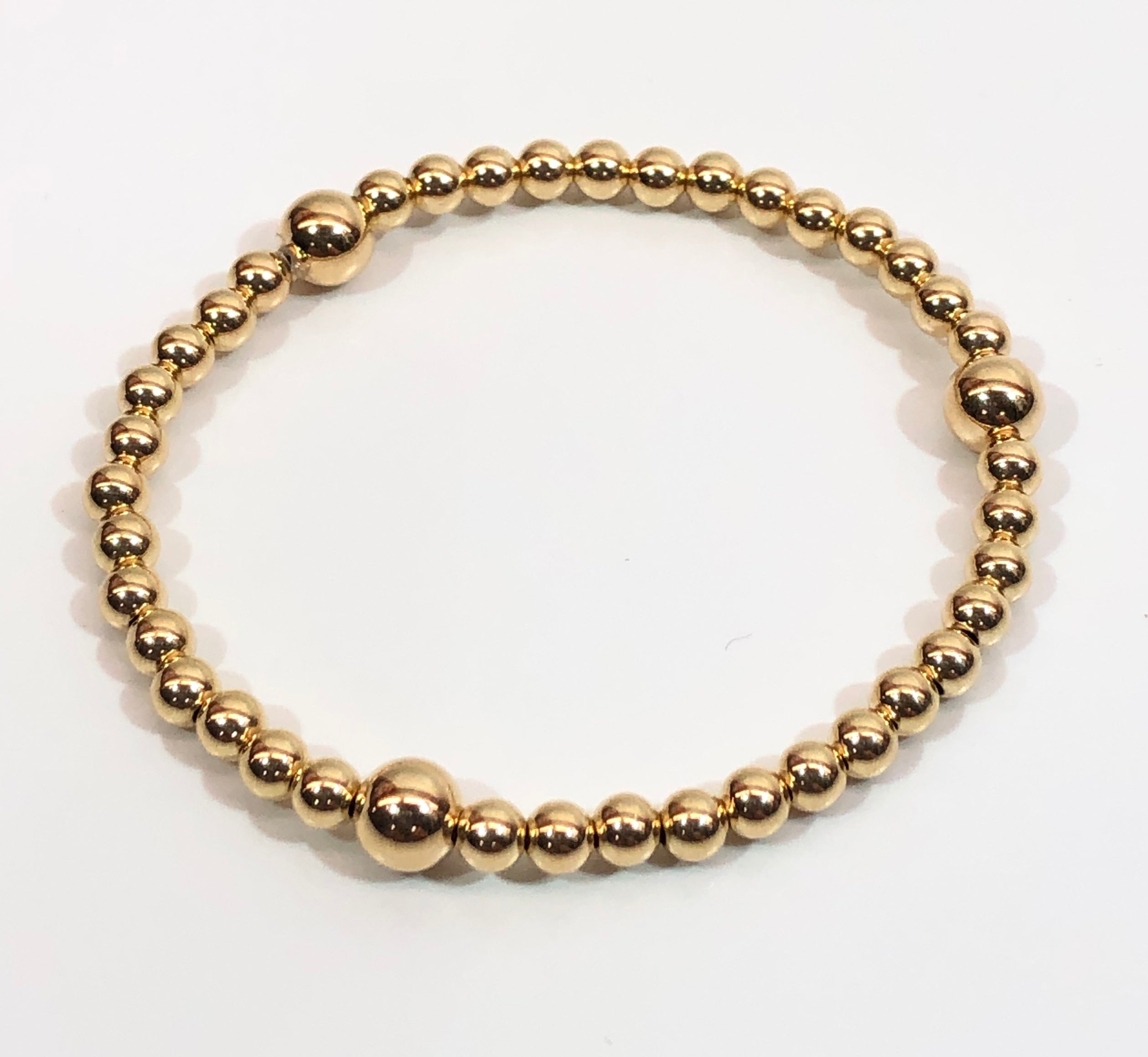 4mm 14kt Gold Filled Bead Bracelet with 3 6mm Gold Beads