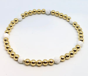 4mm 14kt Gold Filled Bead Bracelet with 7 4mm White Quartz Beads