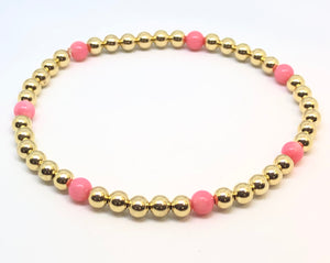 4mm 14kt Gold Filled Bead Bracelet with 7 4mm Pink Coral Beads