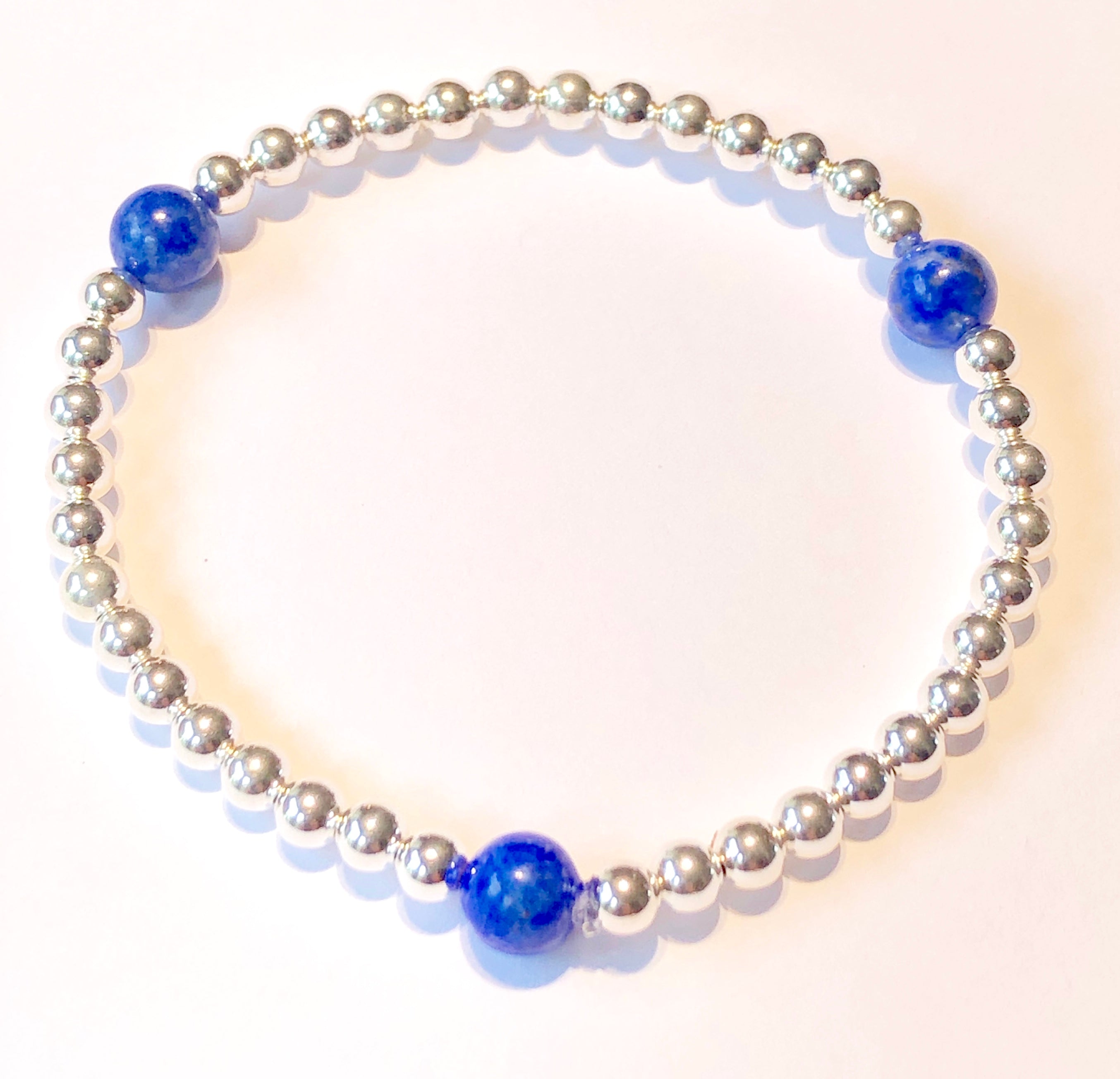 4mm Sterling Silver Bead Bracelet with 3 6mm Lapis Beads