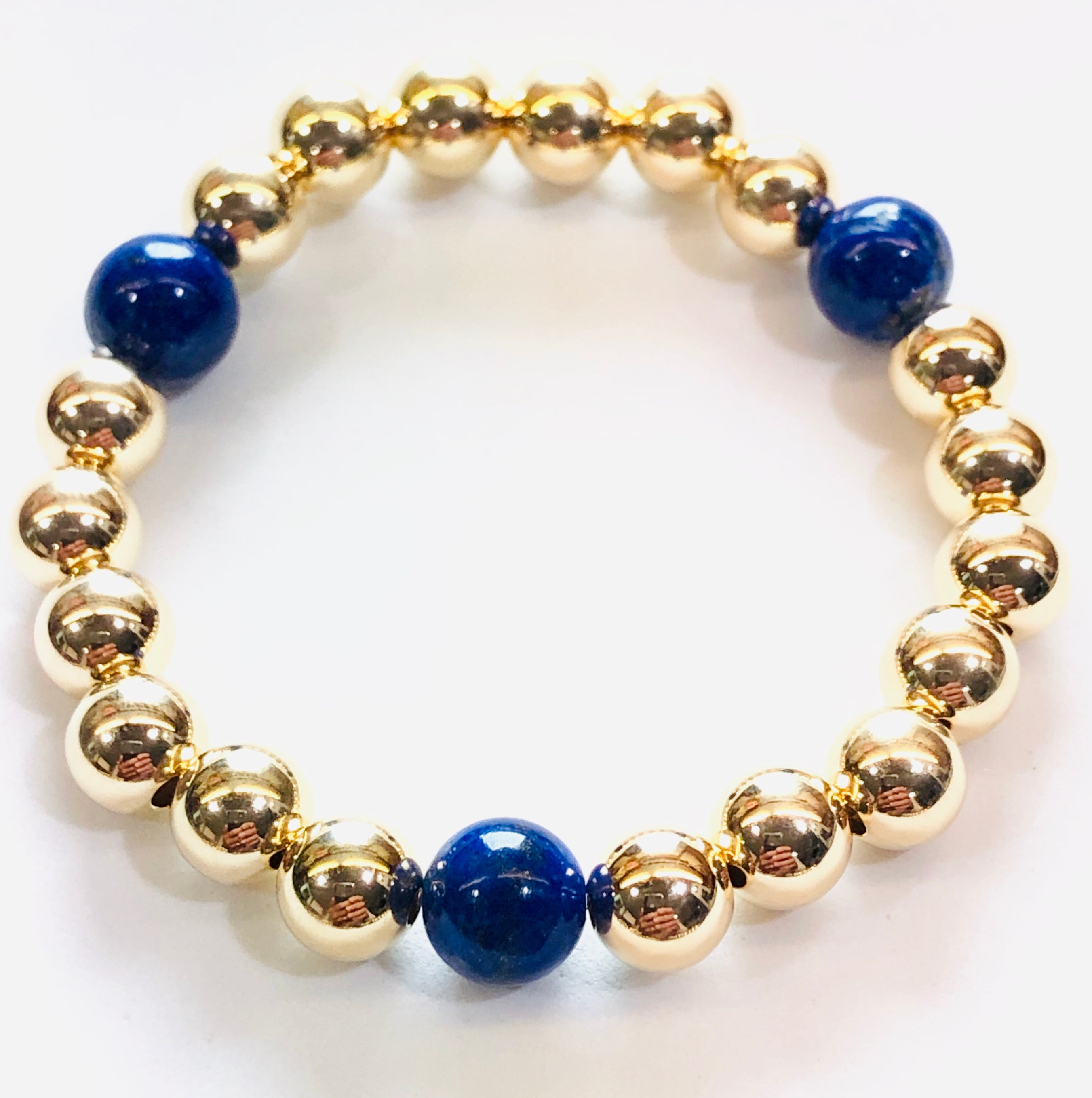 8mm 14kt Gold Filled Bead Bracelet with 3 8mm Blue Lapis Beads